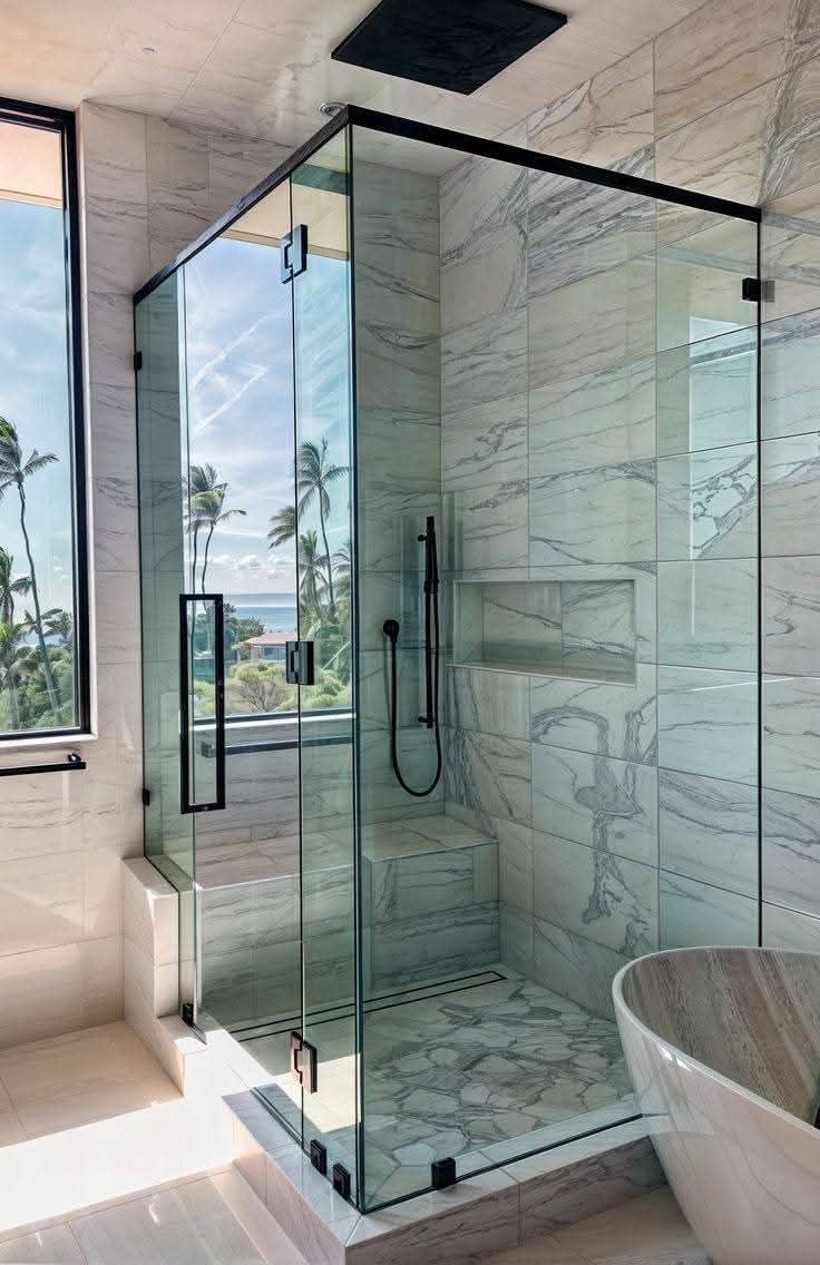 Modern luxury bathroom with frameless glass shower enclosure